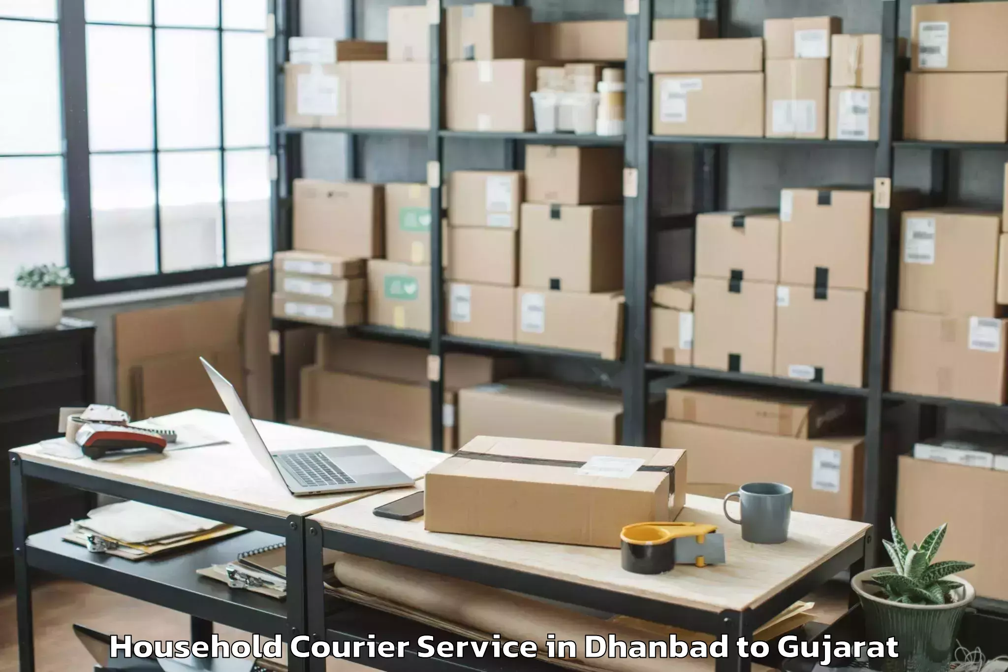 Book Dhanbad to Halol Household Courier Online